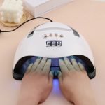 SUN Y9 UV LED professzionális műkörmös lámpa telefontartóval, beépített mozgásérzékelővel és hordozófüllel - 192W (BBV)