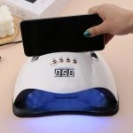 SUN Y9 UV LED professzionális műkörmös lámpa telefontartóval, beépített mozgásérzékelővel és hordozófüllel - 192W (BBV)